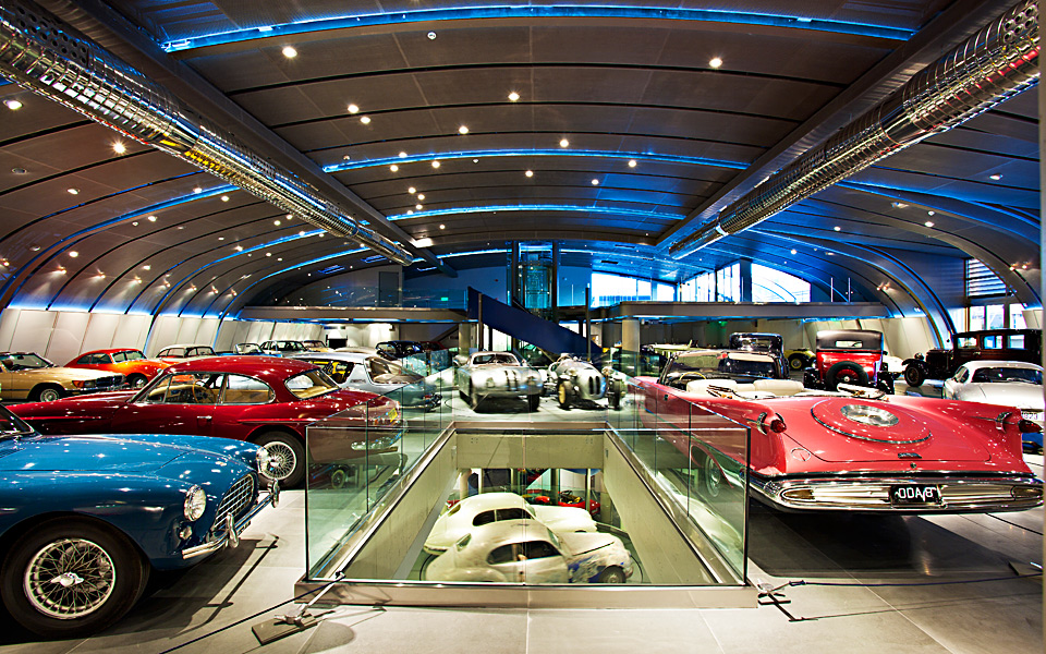 many antique cars inside hellenic motor museum