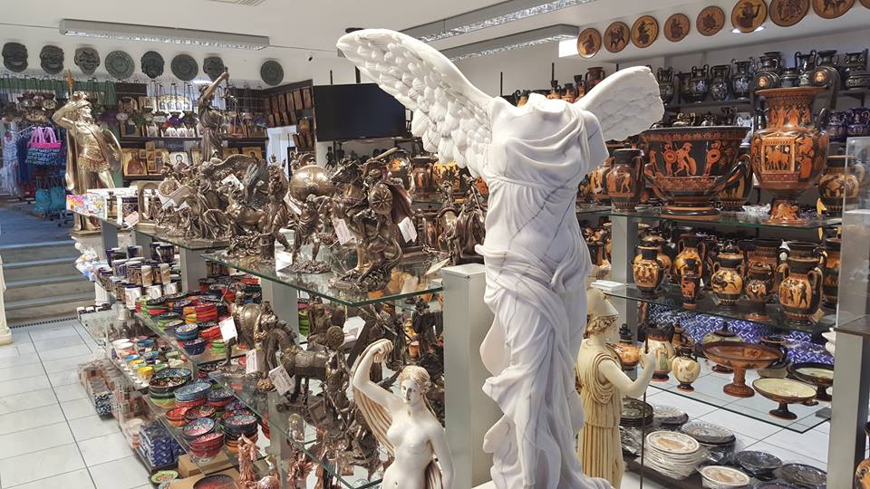 interior of a souvenir shop in Plaka with ceramic pillars, vases and statues
